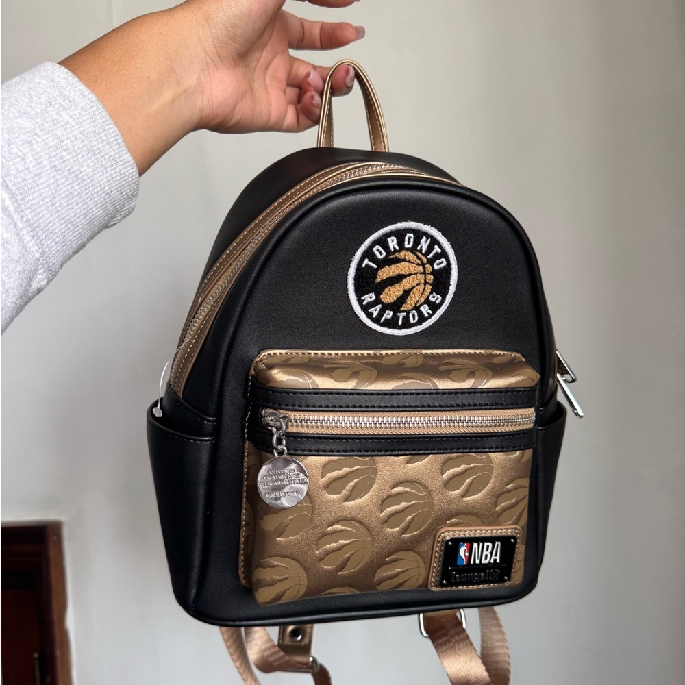 SOLD ✔️NBA Toronto Raptors Black and Gold Mini Backpack